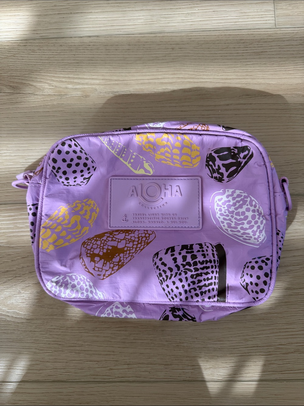 ALOHA collection keep it light Le Tour cross body bag